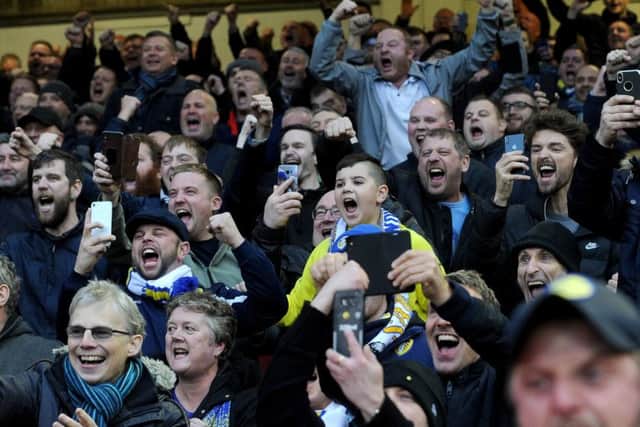 Leeds United fans celebrate Pablo Hernandez's winner.