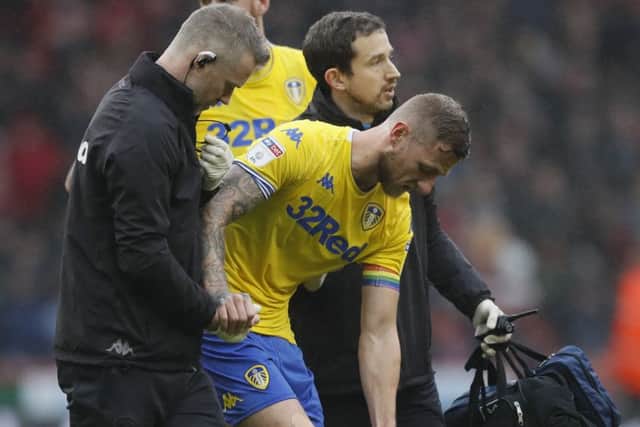 Liam Cooper limps off against Sheffield United.