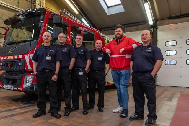 Pictured with Mr Dulson are firefighters Steve Bartle, Wayne Moore, Ryan Simpson, Watch Commander Phil Norman Swallow and Simon Littewood