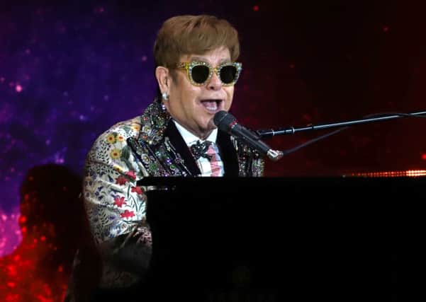 Sir Elton John stars in this year's John Lewis Christmas advert, The Boy and the Piano, which flashes back through his career to the inspirational gift he received when he was three. Picture: Greg Allen/PA Wire
