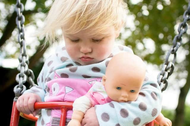 Izzy fell asleep on the swing - and it turned out to be a sign of cancer. Photo: SWNS
