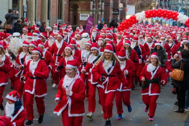 Annual Santa Dash around Leeds City Centre in aid of St Gemma's Hospice.