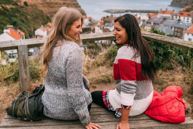 Sinead Crowe, left, of LoveStyleMindfulness wears Seahouse knit, Â£79.95; Bonnie Rahkit, aka The Style Traveller, wears Padstow knit, Â£99.95. All at Barbour.com.