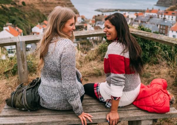 Sinead Crowe, left, of LoveStyleMindfulness wears Seahouse knit, Â£79.95; Bonnie Rahkit, aka The Style Traveller, wears Padstow knit, Â£99.95. All at Barbour.com.