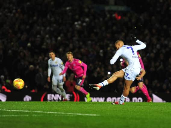 Leeds United's Kemar Roofe slots home a penalty against Queens Park Rangers - the club's first in 59 matches.