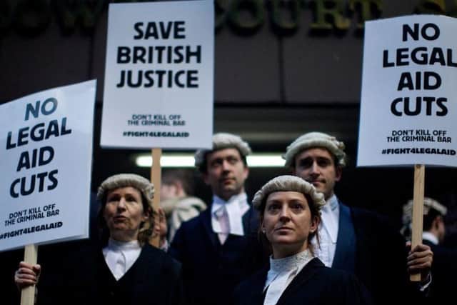 Barristers protesting legal aid cuts