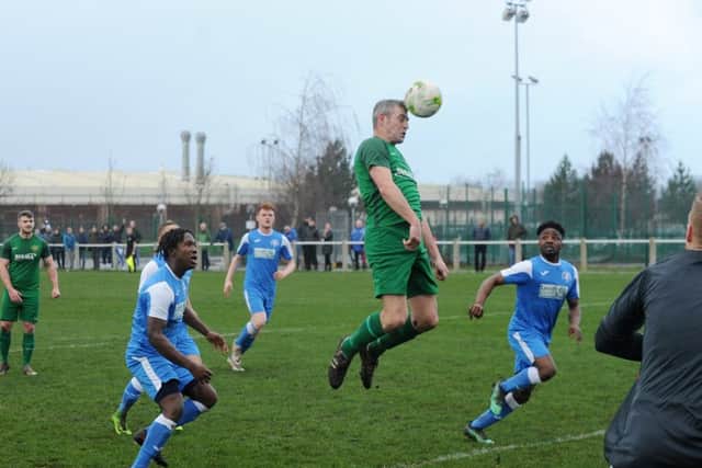Sean Jeavons scores his first goal for Beeston against Whitkirk. He scored two in the 5-0 win. PIC: Steve Riding