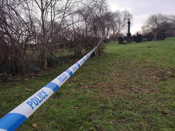 A police cordon is in place at Holbeck cemetery