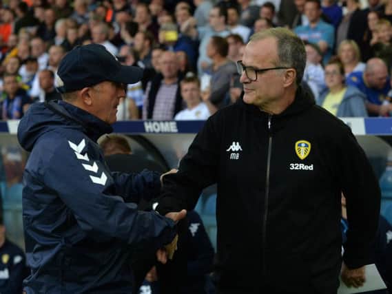 Leeds United head coach Marcelo Bielsa greets Middlesbrough boss Tony Pulis.