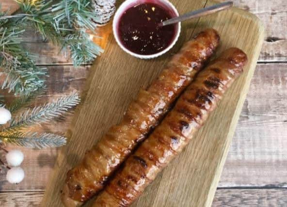 Marks & Spencer has decided to up their game with Christmas dinner foods, by selling foot-long pigs in blankets
 (Marks & Spencer)