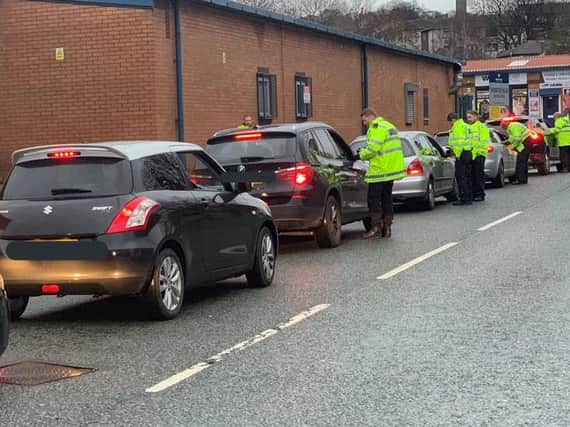 Police pulling over cars to breathalyse drivers. Photo: West Yorkshire Police