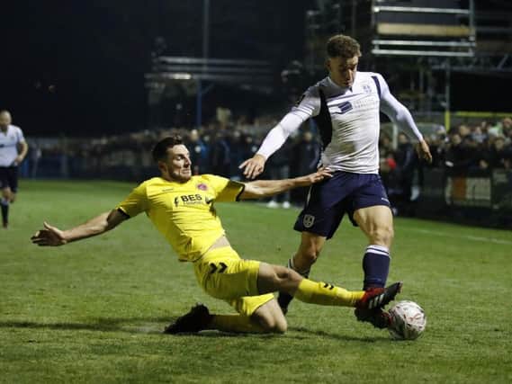 Leeds United loanee Lewie Coyle in action for Fleetwood Town at Guiseley in the FA Cup.