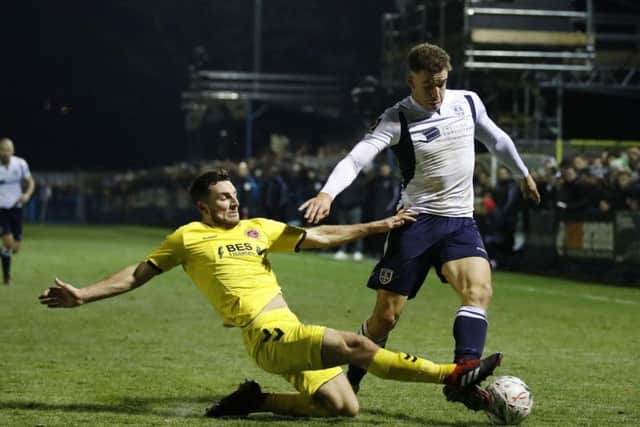 Leeds United loanee Lewie Coyle in action for Fleetwood Town at Guiseley in the FA Cup.