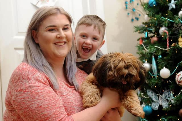 Riley Hoult pictured with mum Sophie Hoult and the family dog Coco at their home at Middleton.
Picture by Simon Hulme