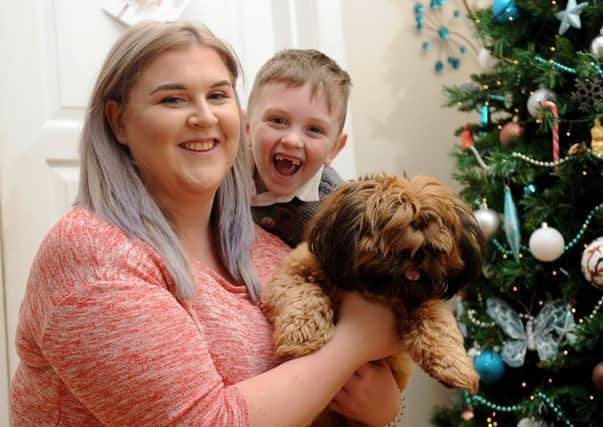 Riley Hoult pictured with mum Sophie Hoult and the family dog Coco at their home at Middleton.
Picture by Simon Hulme