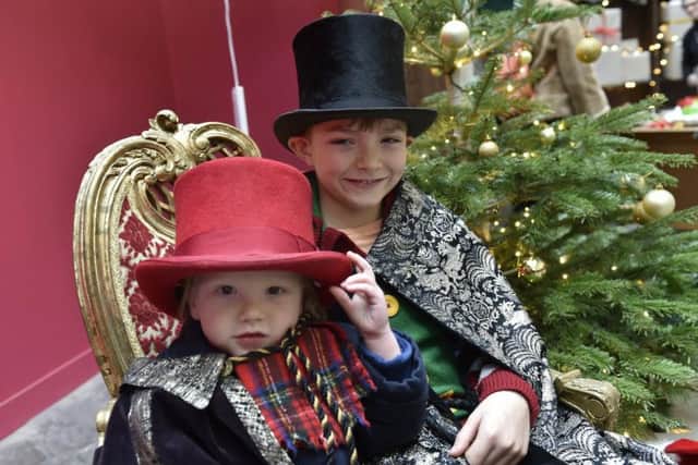 Leeds Playhouse and Leeds Corn Exchange joined  forces to host a free family
friendly takeover day on Saturday. Sammy, three and Oliver, 10 Barker of Armley dressing up.
