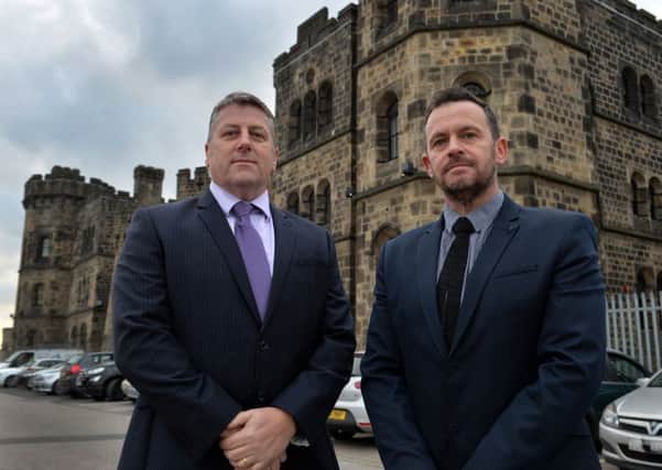 Det Insp David Robert and Det Sgt Lee Stowe, of Leeds District Prison Crime Team.  Picture: Bruce Rollinson