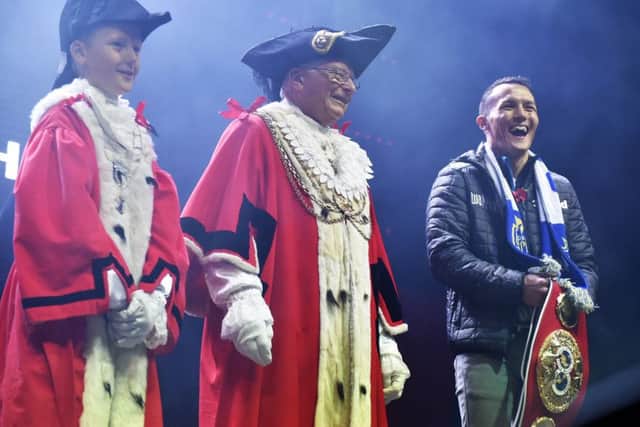 The Junior Lord Mayor of Leeds Rio Abbott, The Lord Mayor of Leeds Coun Graham Latty and Josh Warrington at the switch on