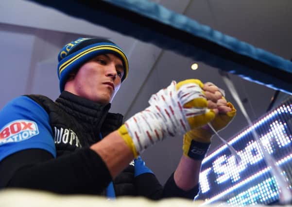 BRING IT ON: Josh Warrington during a public workout at the National Football Museum at Manchester. Picture: Nathan Stirk/Getty Images)