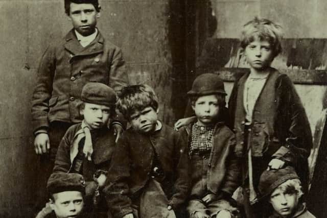 An early picture of children helped by Barbardo's.