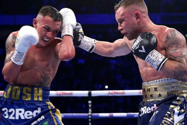 Josh Warrington and Carl Frampton in action in Manchester.