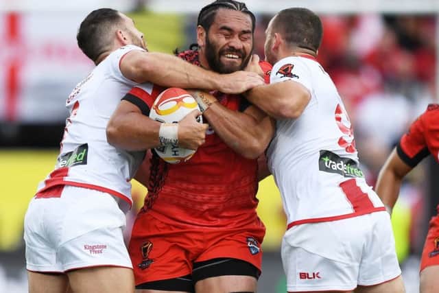 Konrad Hurrell in action for Tonga against England.
