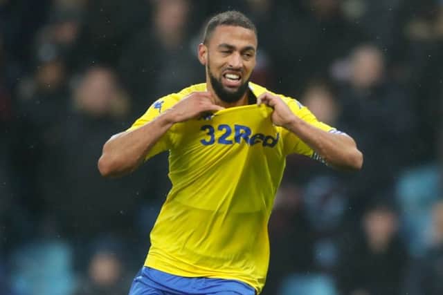 Leeds United's Kemar Roofe prepares to whip off his shirt in celebration at scoring the winning goal at Villa Park. PIC: Nick Potts/PA Wire