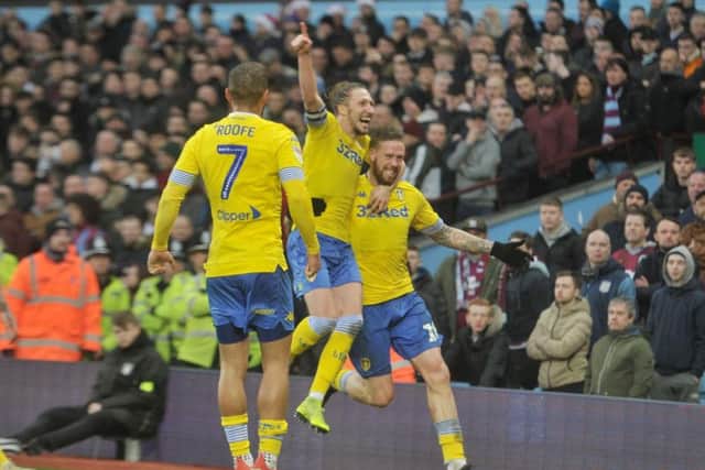 Leeds United's Pontus Jansson celebrates at Villa Park following his goal.