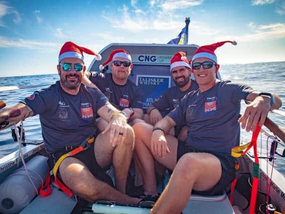 Yorkshire based team Row 4 Victory, (left to right) Fraser Mowlem, Glyn Sadler, Will Quarmby and Duncan Roy, who are spending Christmas day on the Atlantic Ocean competing in the Talisker Whisky Atlantic Challenge. Picture: Talisker Whisky Challenge/PA Wire.