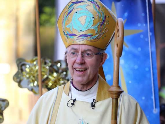 The Archbishop of Canterbury Justin Welby arrives for the Christmas Day service at Canterbury Cathedral. Picture by Gareth Fuller/PA Wire.
