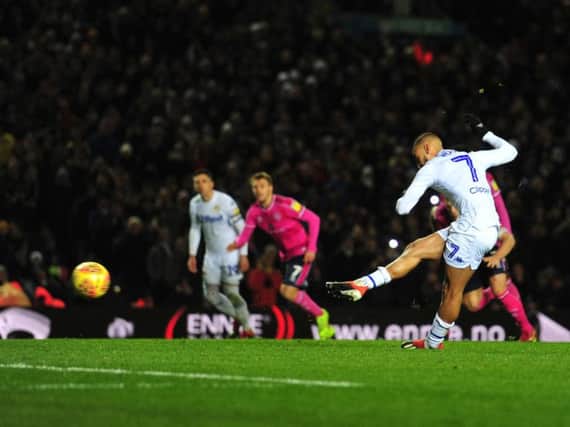 Leeds United striker Kemar Roofe, converting a penalty against Queens Park Rangers.