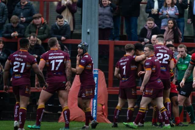 Batley Bulldogs players celebrates during their 16-10 friendly victory over Dewsbury Rams.