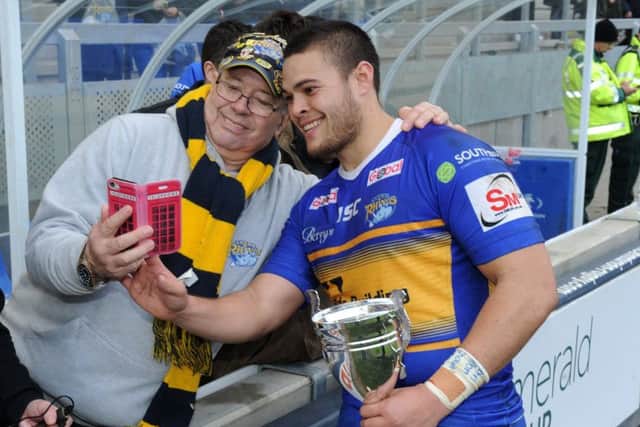Tui Lolohea with Leeds Rhinos fans after the game.