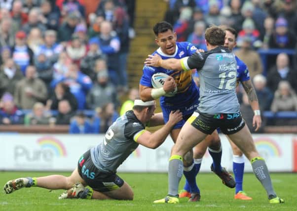 NO WAY THROUGH: Leeds Rhinos' Nathaniel Peteru finds his path blocked in the Boxing Day clash with Wakefield Trinity. Picture: Steve Riding/Varleys.