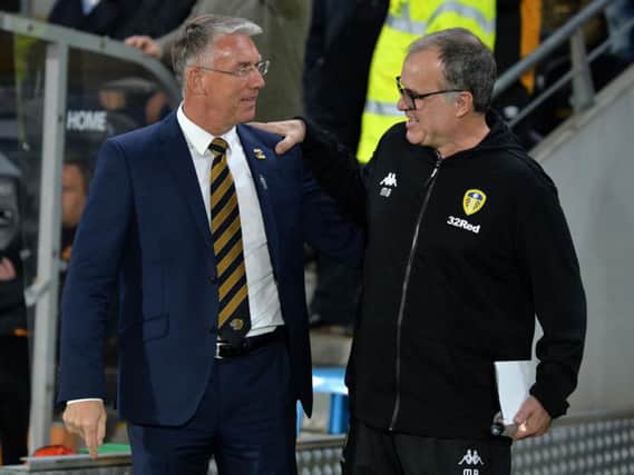 Leeds United boss Marcelo Bielsa (R) refused to criticise his players following Hull City defeat.