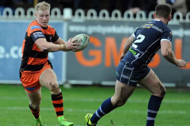 Cas wingers Kieran Gill, above, and Lewis Carr both ened the game against Featherstone with try hat-tricks. PIC: Steve Riding