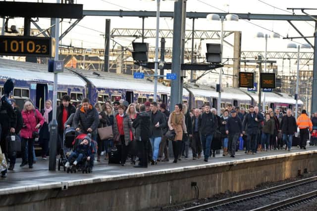 Pasengers at Leeds Station - the New Year begins with fare increases. Are they justified?