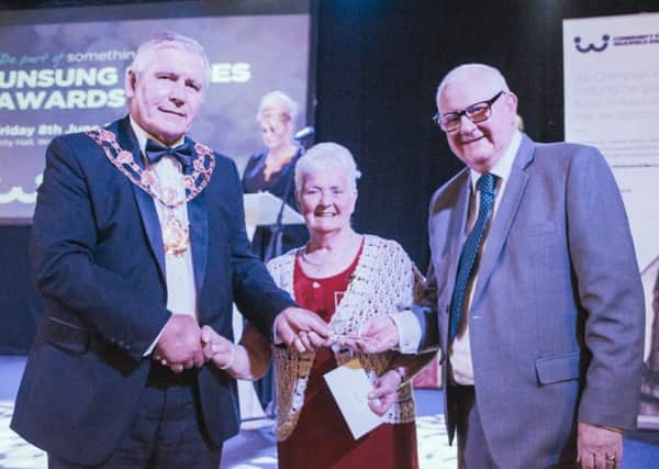 The Mayor  of Wakefield, Coun Stuart Heptinstall, left, presented an Unsung Heroes award to Josie Hemingway and Tom Long for their work with the Horbury Senior Citizens' Support Group.