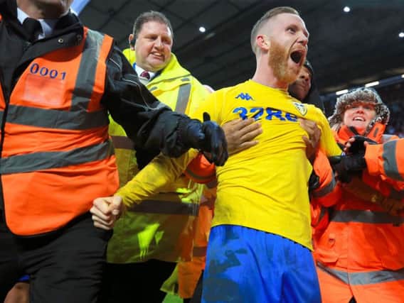 THRIVING: Adam Forshaw celebrates Leeds United's late winner at Aston Villa.