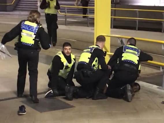 The man is arrested on the platform