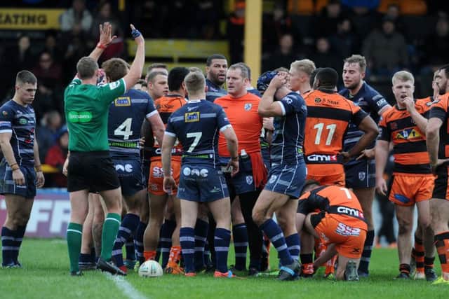 Castleford Tigers and Featherstone Rovers disagree during Sunday's friendly