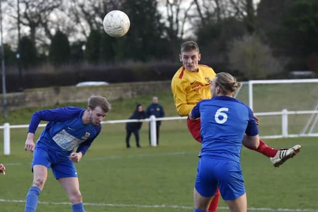 John Mallison heads goalwards for Aberford Albion against Division One visitors Kirk Deighton Rangers. The game was abandoned by the referee in the second half with score 0-0. PIC: Steve Riding