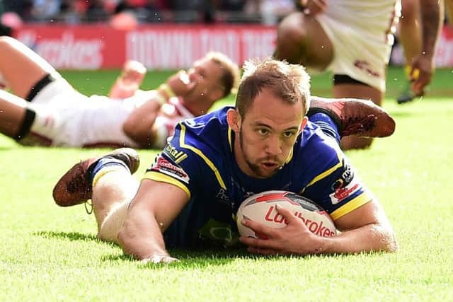 George King touches down for Warrington Wolves in the Challenge Cup final.
