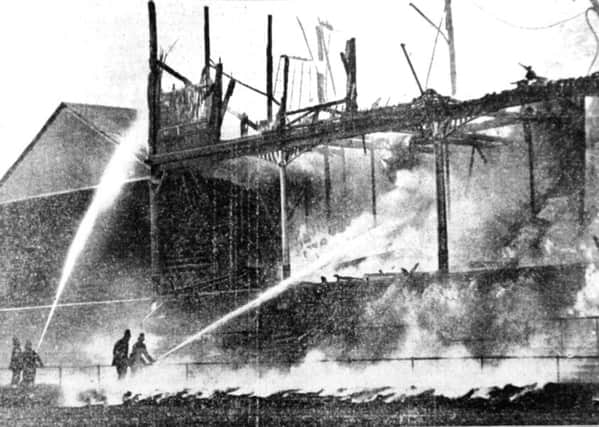 The fire brigade fight the blaze in Headingleys old North Stand in 1932 which began during Leeds game with Halifax.
