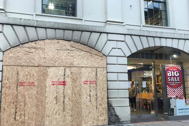 The city centre Paperchase has been boarded up following a building fire.