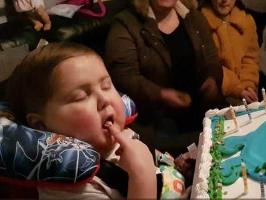 Toby also had a dinosaur-themed birthday cake
