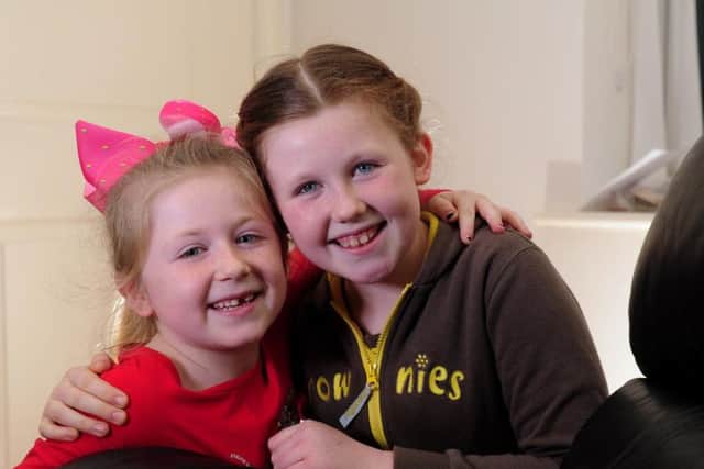 Amelia Wood (right) with her sister Annabel,8, has managed to get all 53 Brownie badges