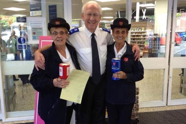 FUNDRAISING: Salvation Army members drumming up funds for the charity.