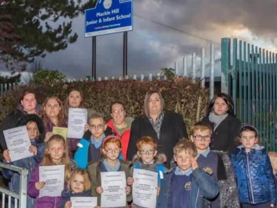 Parents had petitioned against the academy order. Photo by Lee Ward.