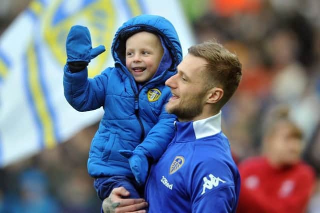 Toby Nye with Leeds United's Liam Cooper